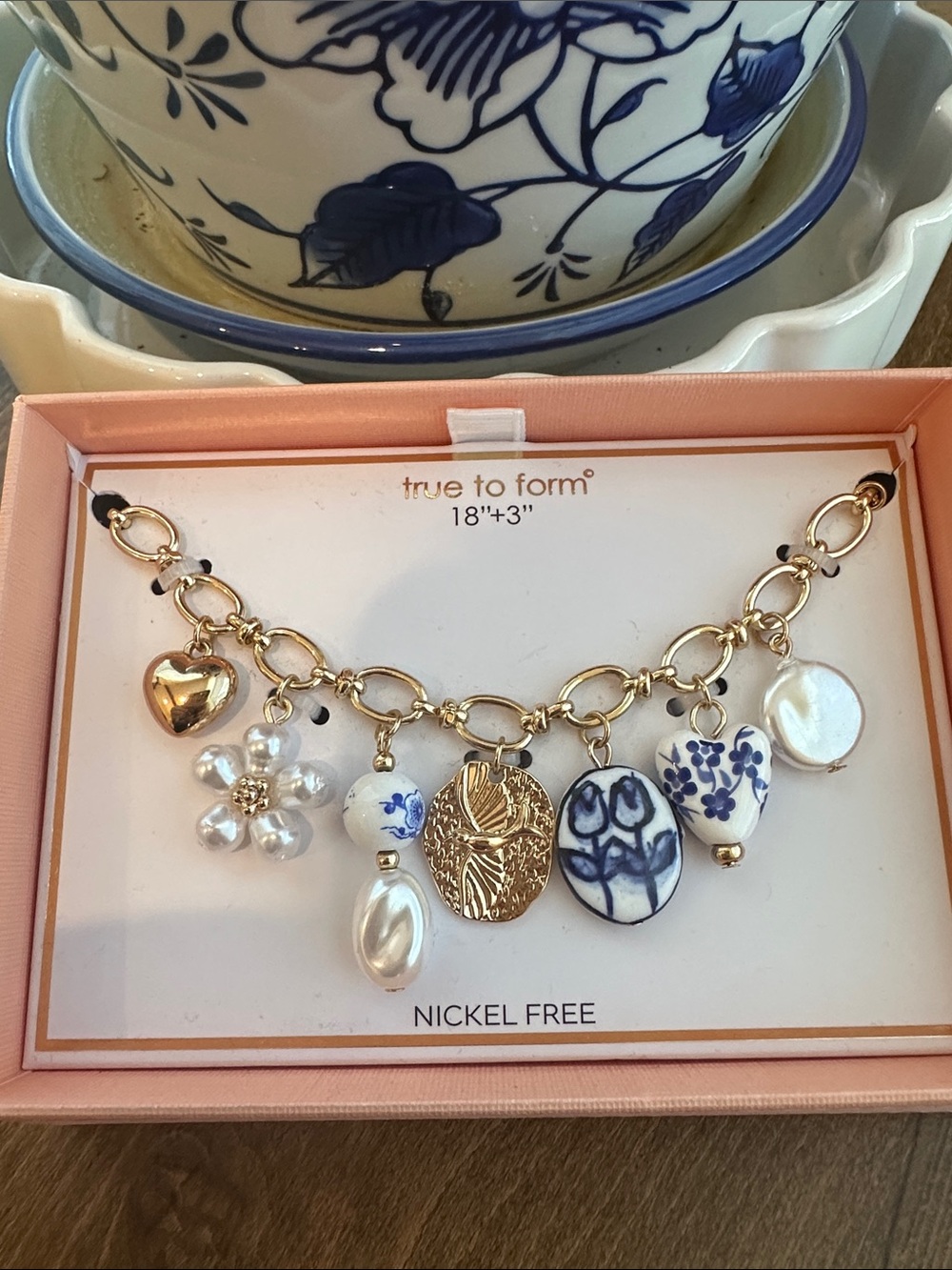 true to form Gold Charm Necklace with Blue & White Porcelain and Pearl Accents